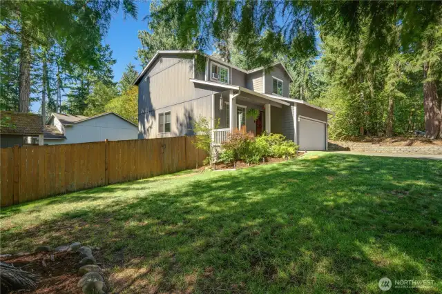 Being on a corner lot, you'll find an expansive front yard, in addition to the fully-fenced backyard. This lot lives much larger than .23 acres!
