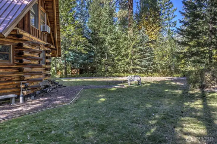 Mazama river front cabin side yard.