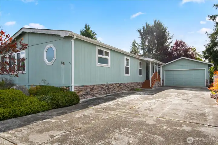 Spacious home on a large lot.  Stick built double car garage with power and automatic garage door opener, side door.