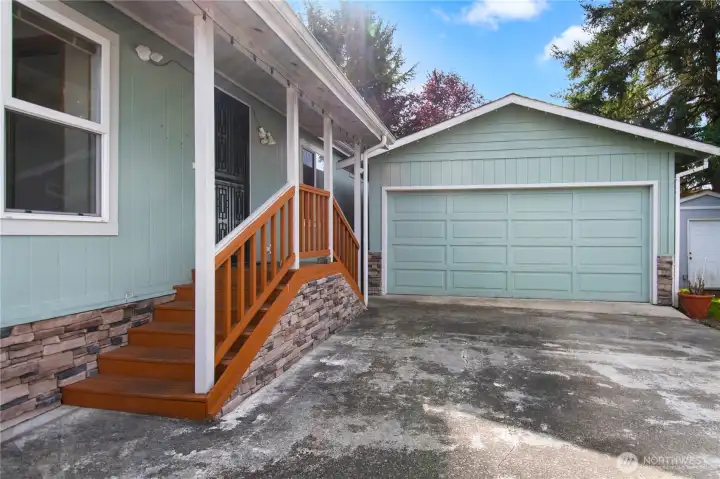 This double car garage has plenty of outlets, garage door opener, and side door for access to the primary residence or its back deck.