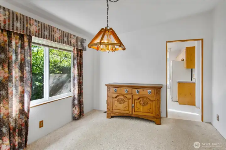 Dining room with entry to the kitchen.