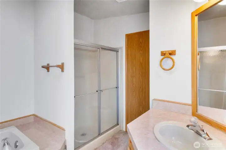The second linen closet is located conveniently across from the oversized shower.