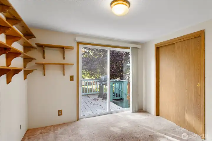 Bedroom #2 has a large closet and its own access to the large back deck.