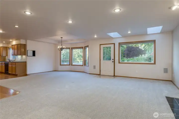 Another view of the family room and how it's adjacent to the kitchen areas