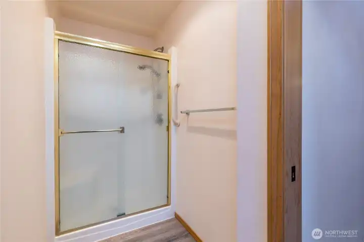 A walk-in shower; the baths of the home are exceptionally well designed, and very user friendly