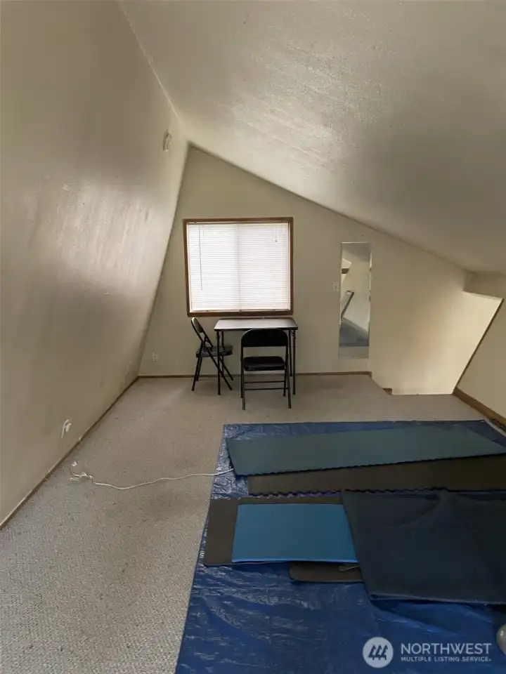 Generous sized loft could be bedroom, office, flex space