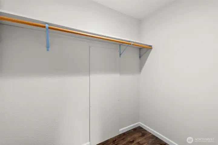 Walk-in closet in primary bedroom