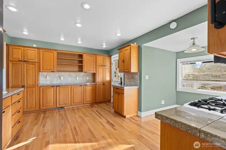 Another view of kitchen with the eating nook off to the right