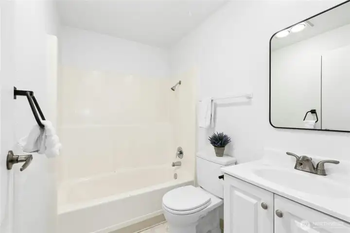 Newer easy-care full bath starts and ends your day in a good way.