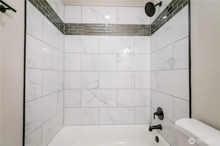 MAIN BATH SHOWER....LOVE THE BIG TILES...MAKES CLEAN UP A BREEZE