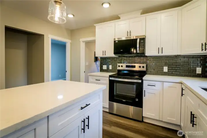 LOTS OF WORKING SPACE AND PLENTY OF CABINETS