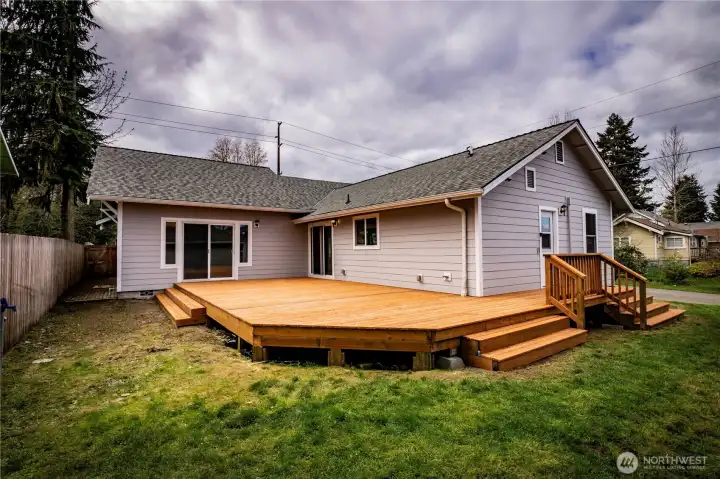 NEW DECK...TO LEFT SLIDER TO PRIMARY....SLIDER TO DINING/KITCHEN ON RIGHT