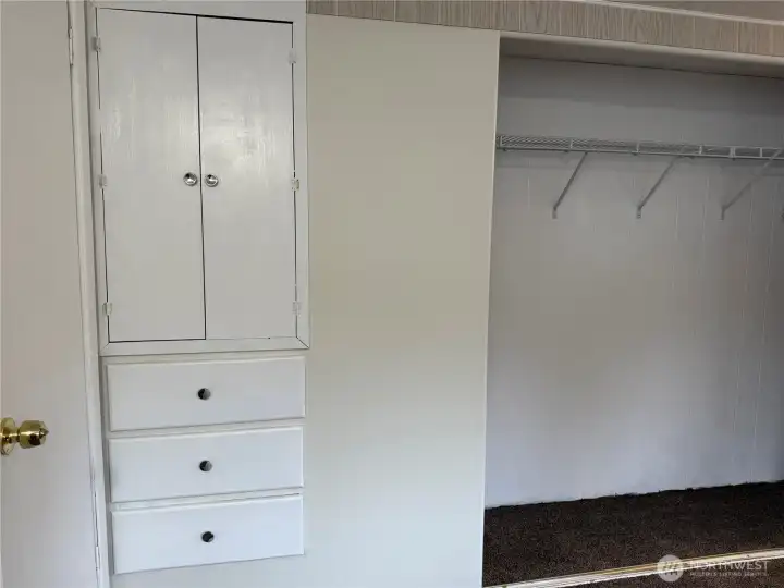 Next to the closet are these charming built ins