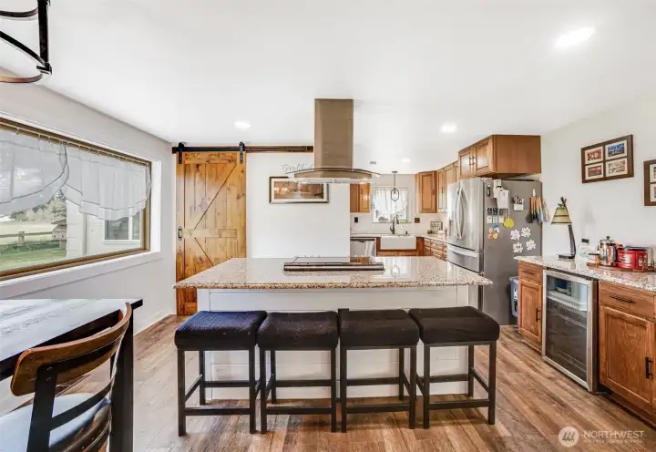 Built In Wine Cooler and Barn Door to Pantry