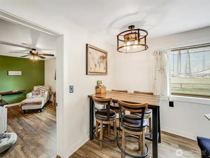 Dining room facing Mt Rainier and Flex space off Kitchen