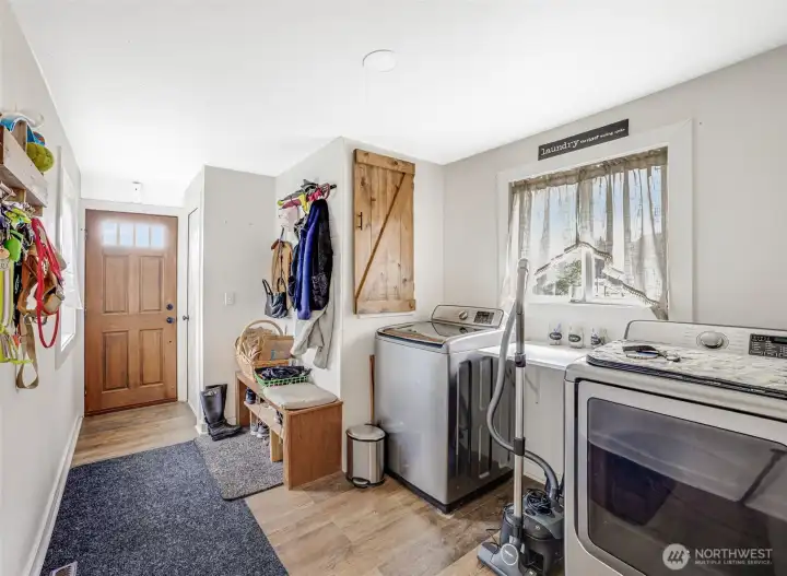 Mud Room/Flex Room with Barn Door accents and access to kitchen.
