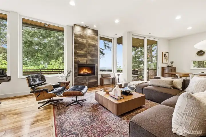 Main living framed by natural light and serene outlooks