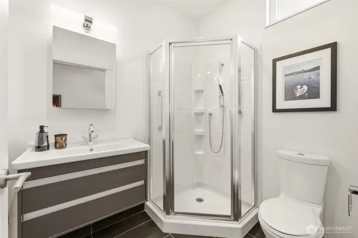Beautifully finished bath serving the main-floor apartment