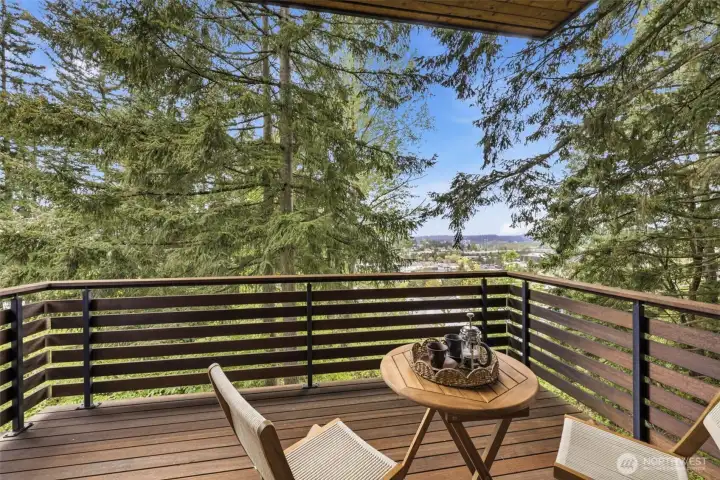 A private primary deck with a calm, elevated feel