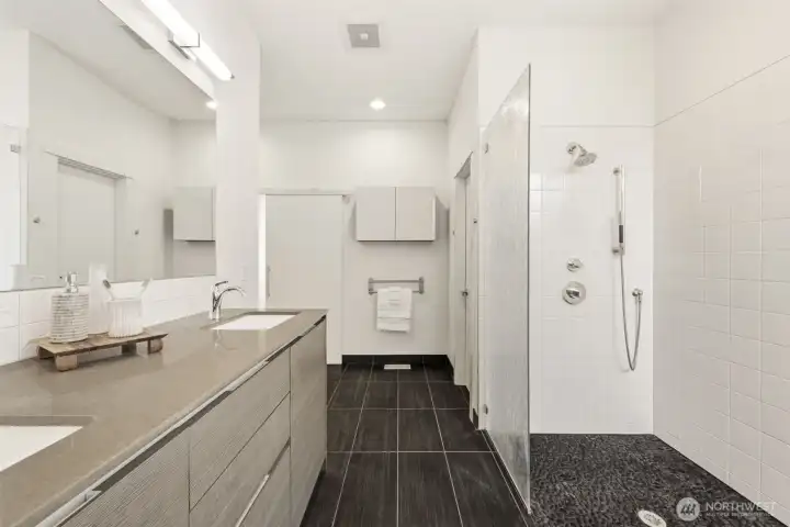 Spa-like primary bath with heated floors