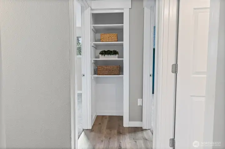 Upstairs hallway storage located between bedrooms two and three.