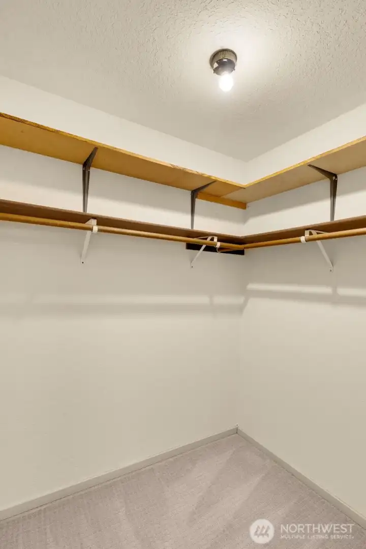 Large walk-in closet off of the primary bedroom Large walk-in closet off of the primary bedroom