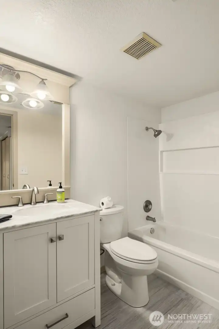 Bathroom includes tub and shower Bathroom includes tub and shower