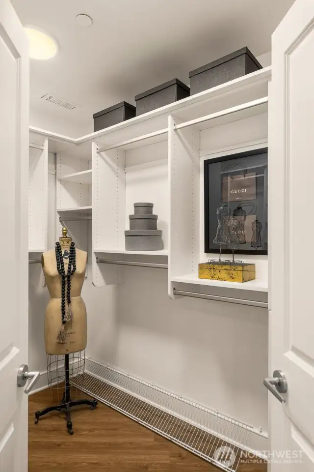 Large walk-in closet provides ample storage for all of your closthes.