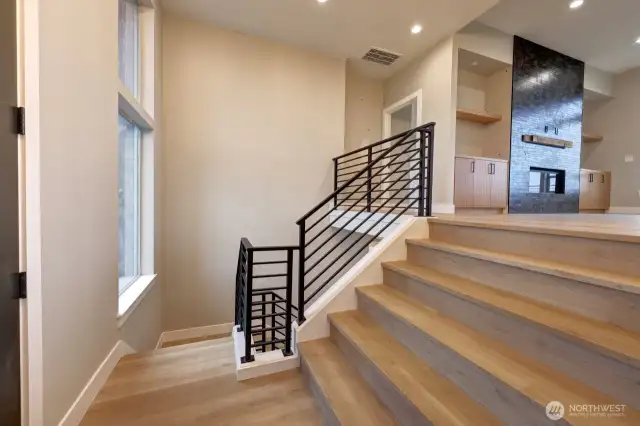 Entry way showing living room and stairs to lower level