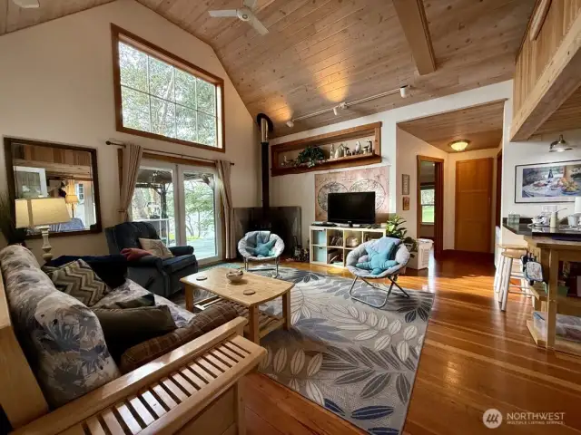 Living room, kitchen and lofted sleeping space (above kitchen) of guest home #2