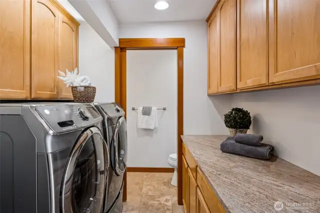 1/2 bath and laundry #1 just off the kitchen
