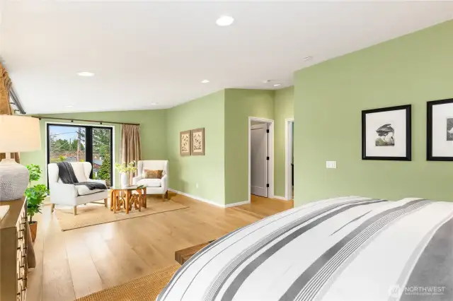 Seating area included. Plus east facing wall of windows to wake up to.