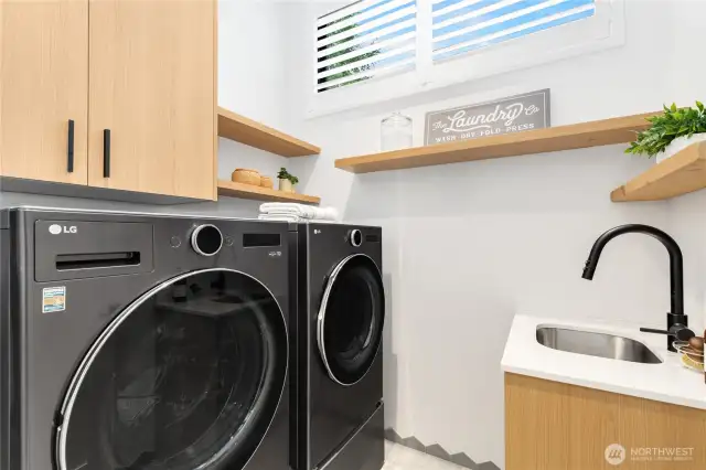Walk-in laundry room on the upper level. So convenient!