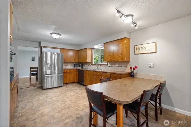Kitchen eat in area, just pull up a chair