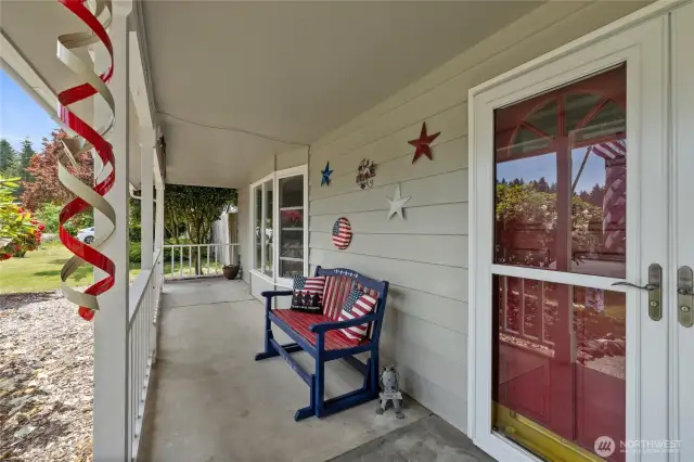 Enjoy the breeze on the covered porch in the front and in the back