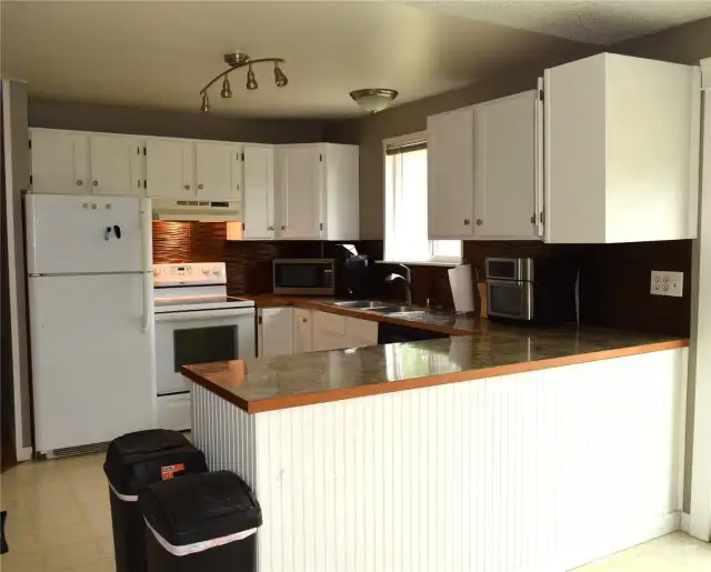Roomy kitchen with attached island