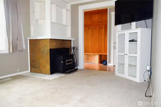 Wood burning insert for cozy winter nights and built in display shelves