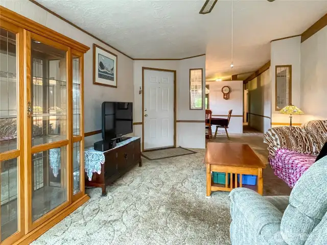 Living room looking toward entry and dining room