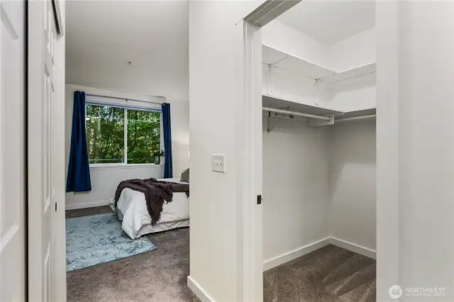 Primary has two closets! One to the left here, and a walk-in to the right.