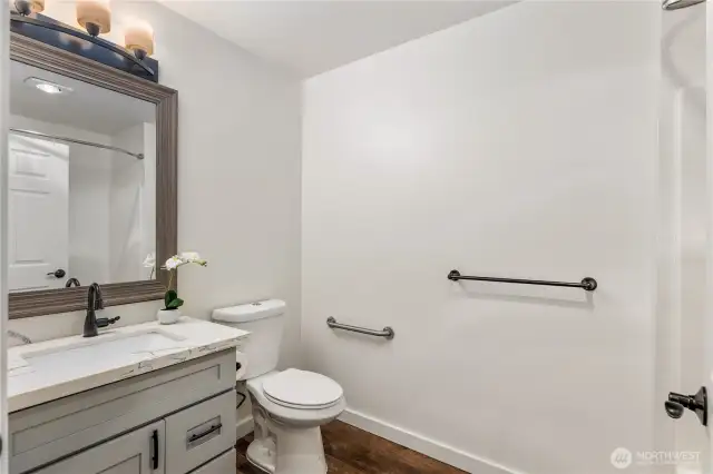 Second bathroom is across form the second bedroom.