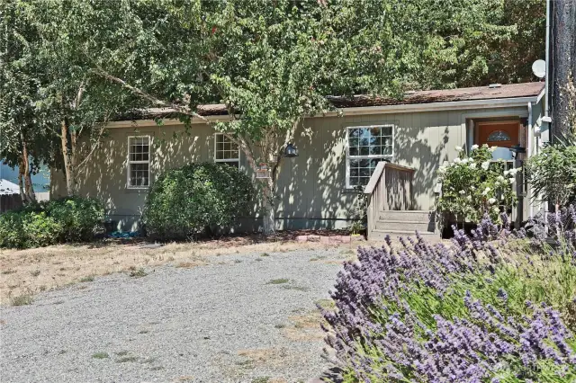 Welcome to this cute Freeland home. The trees in front offer privacy and shade while also adding some character.