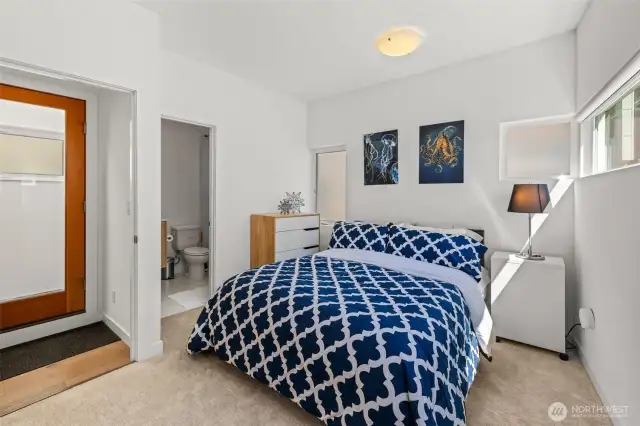 The second upstairs bedroom has a spacious closet and a full bath.