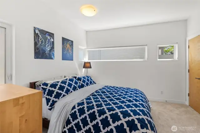 The second upstairs bedroom has a spacious closet and a full bath.