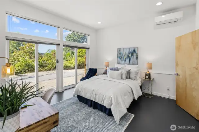 This lower-level bedroom is spacious and bright.