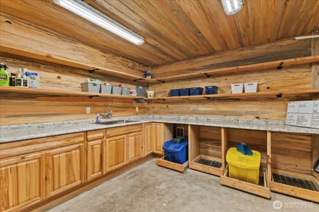 Heated, with hot water, pull out grain drawers, saddle and blanket racks, shelves, cabinets, tons of storage!