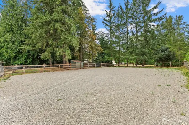 A dream for horse lovers! This property boasts a well-maintained barn with multiple stalls, a dedicated tack room, and a 60 x 80 riding arena.