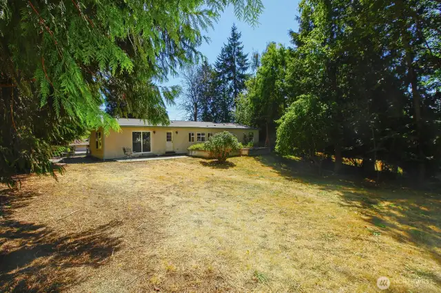 Fully fenced back yard portion