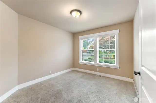 Large office with windows to the front.