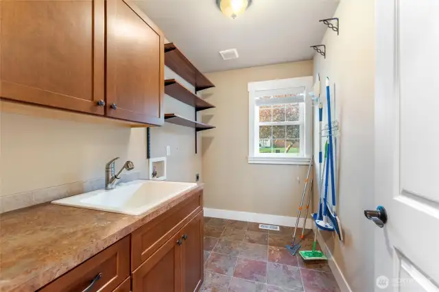 Laundry room with sink.