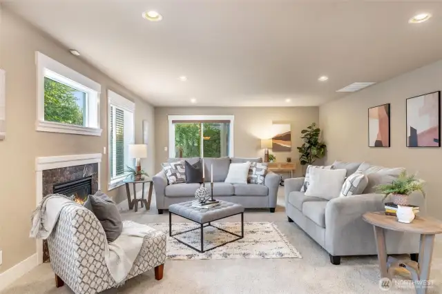 Entertain in this large living room with access to backyard.